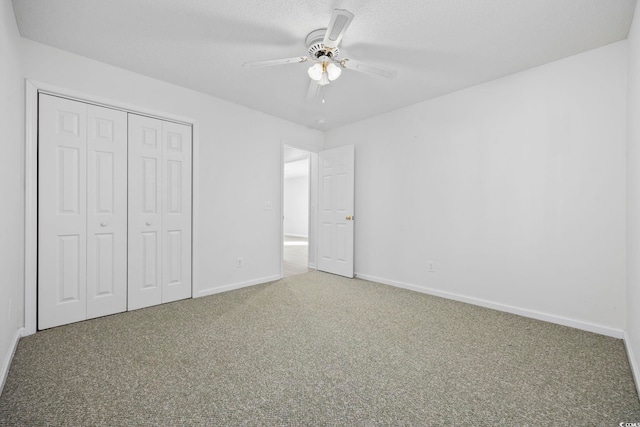4430 Eastport Blvd Unit L5, Little River, SC 29566 - unfurnished bedroom featuring carpet, a closet, baseboards, and ceiling fan