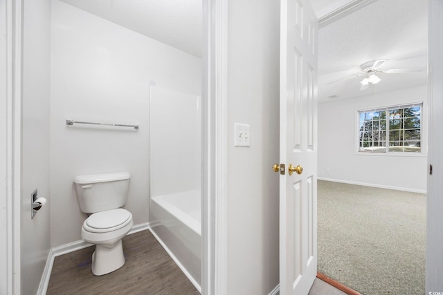 4430 Eastport Blvd Unit L5, Little River, SC 29566 - bathroom with a ceiling fan, baseboards, a textured ceiling, and toilet