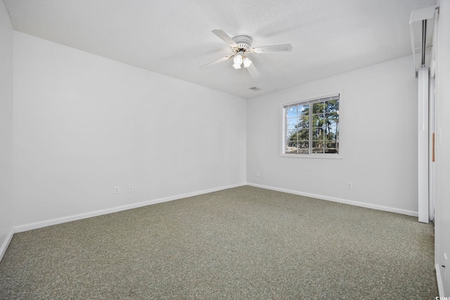 4430 Eastport Blvd Unit L5, Little River, SC 29566 - spare room with ceiling fan, baseboards, a textured ceiling, and carpet