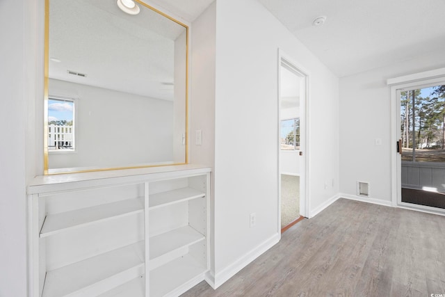 4430 Eastport Blvd Unit L5, Little River, SC 29566 - unfurnished room featuring baseboards, wood finished floors, and visible vents