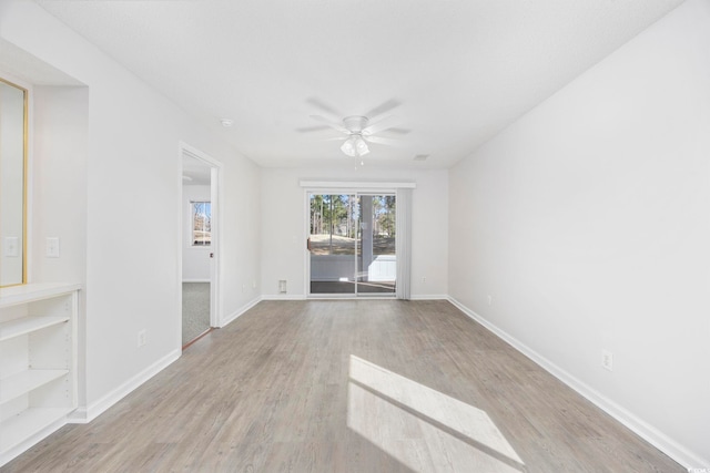 4430 Eastport Blvd Unit L5, Little River, SC 29566 - spare room with ceiling fan, baseboards, and wood finished floors