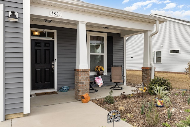 1881 Moonseed Dr, Longs, SC 29568 - doorway to property with a porch