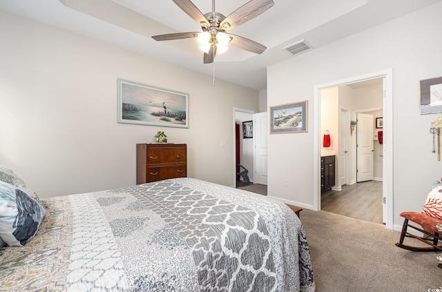 1881 Moonseed Dr, Longs, SC 29568 - carpeted bedroom with baseboards, a ceiling fan, and ensuite bath