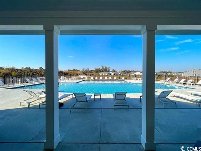 1881 Moonseed Dr, Longs, SC 29568 - community pool featuring a patio