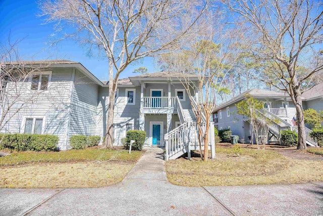 view of property with stairway