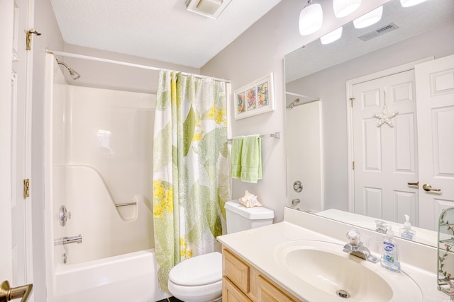 bathroom with visible vents, toilet, a textured ceiling, and shower / bath combo