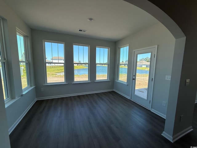 4008 Bucolic Loop, Myrtle Beach, SC 29588 - unfurnished sunroom featuring arched walkways and a water view