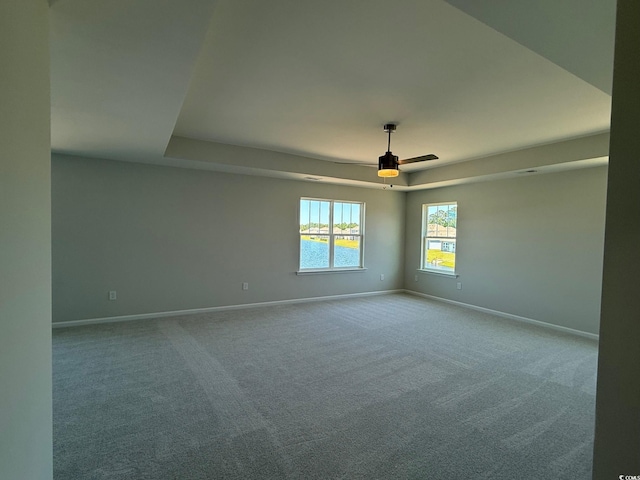 4008 Bucolic Loop, Myrtle Beach, SC 29588 - carpeted empty room with baseboards, a tray ceiling, and a ceiling fan