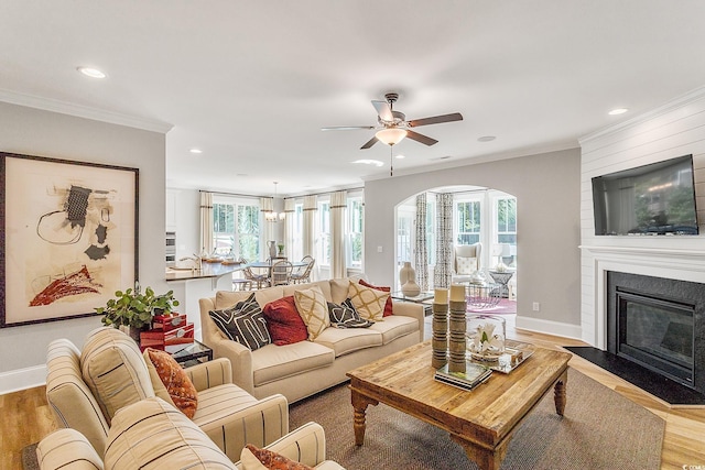 4008 Bucolic Loop, Myrtle Beach, SC 29588 - living room with healthy amount of natural light, recessed lighting, ornamental molding, wood finished floors, and a ceiling fan