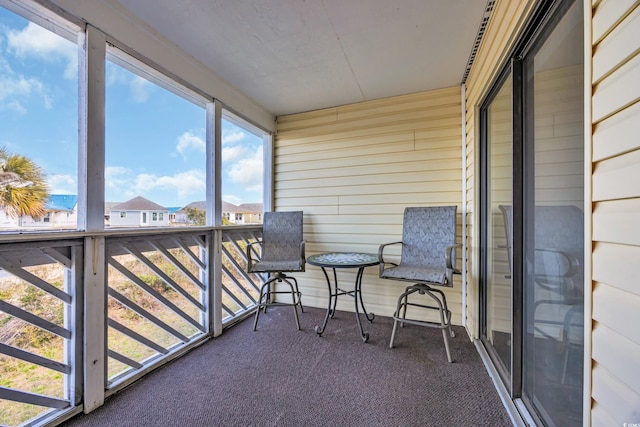 sunroom featuring a wealth of natural light