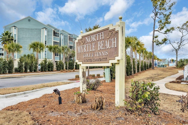 view of community sign