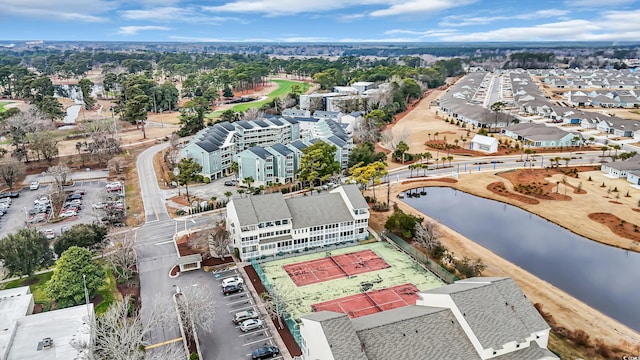 bird's eye view featuring a residential view and a water view