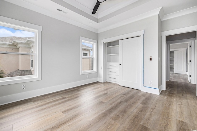 1217 Bentcreek Ln, Myrtle Beach, SC 29579 - unfurnished bedroom with wood finished floors, baseboards, a closet, ceiling fan, and ornamental molding