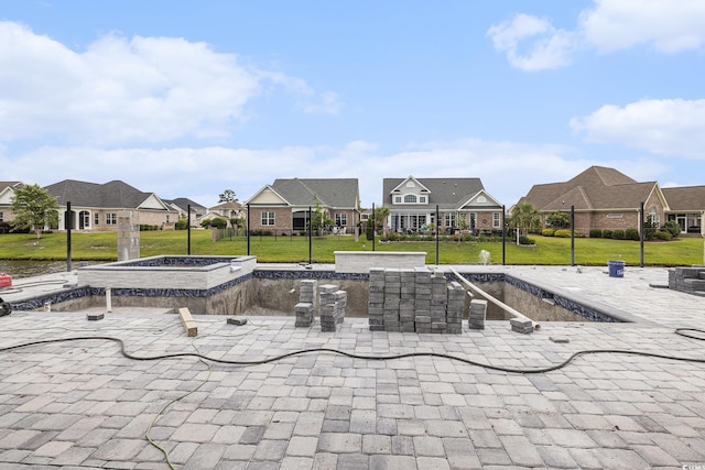 1217 Bentcreek Ln, Myrtle Beach, SC 29579 - view of home's community with a residential view, a jacuzzi, a lawn, and a patio area