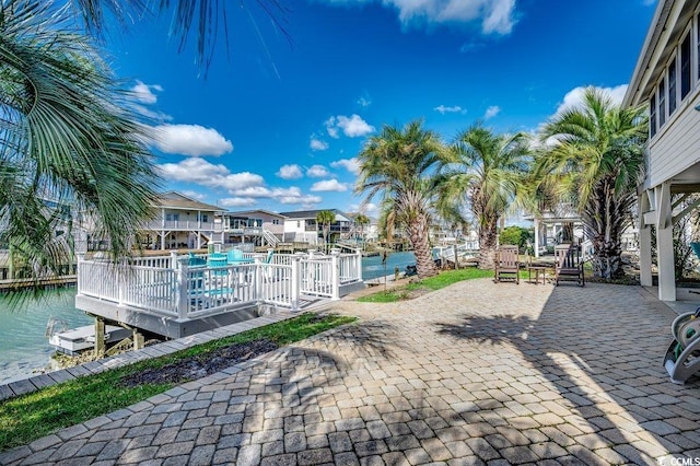 view of community featuring a water view and a residential view