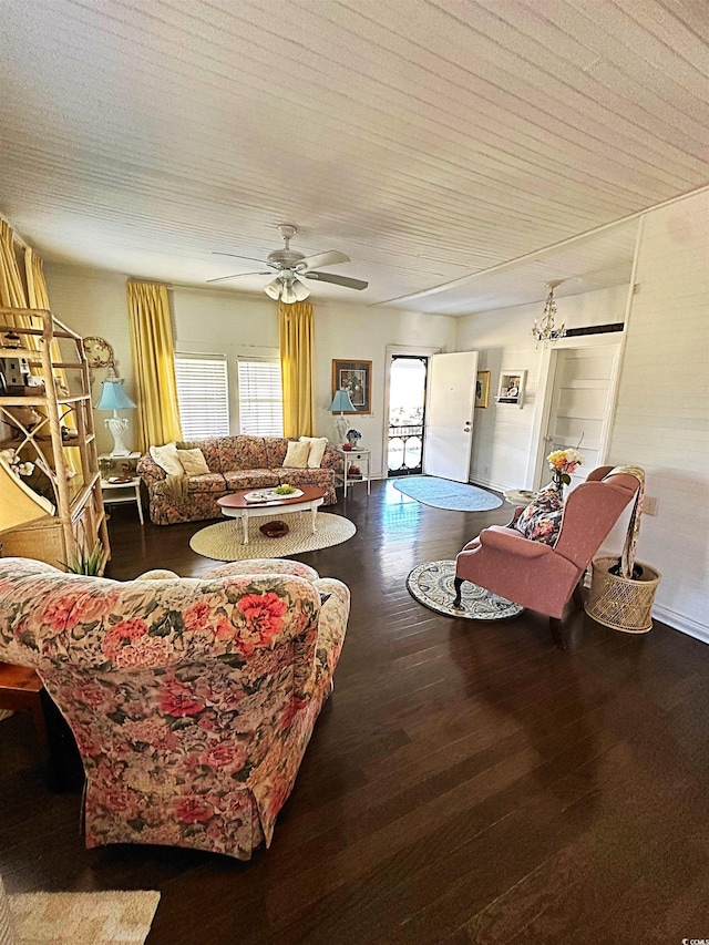 living room featuring a ceiling fan and wood finished floors