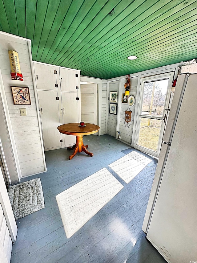 interior space featuring wooden ceiling