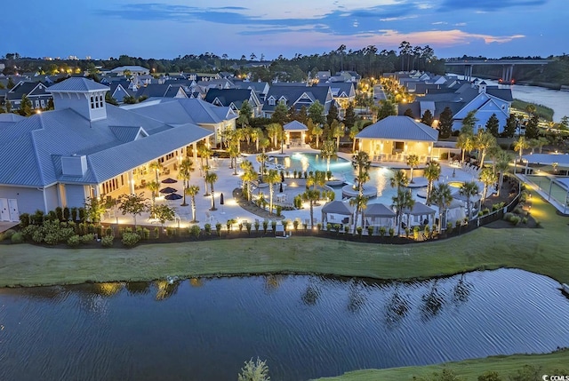 aerial view with a residential view and a water view