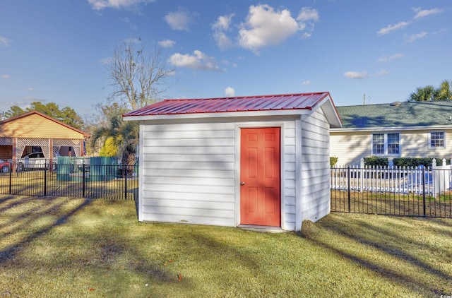 view of shed with fence