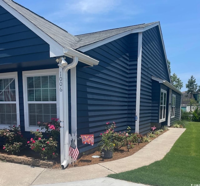 1006 Charles St, North Myrtle Beach, SC 29582 - view of home's exterior with a shingled roof