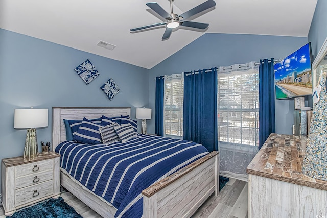 1006 Charles St, North Myrtle Beach, SC 29582 - bedroom with wood finished floors, lofted ceiling, and a ceiling fan