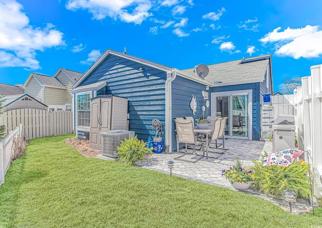 1006 Charles St, North Myrtle Beach, SC 29582 - back of house featuring a fenced backyard and a patio area
