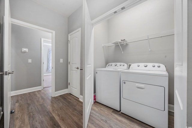 108 Silver Peak Dr, Conway, SC 29526 - laundry room with washer and dryer, wood finished floors, and baseboards
