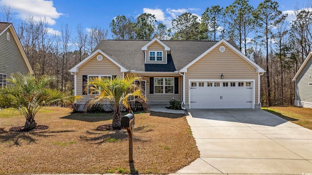 traditional-style house with an attached garage, roof with shingles, and driveway