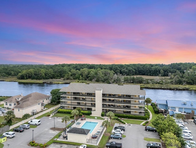 birds eye view of property featuring a water view