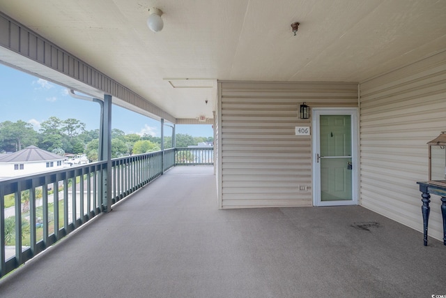 view of patio featuring a balcony