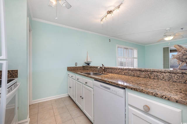 kitchen featuring crown molding, a ceiling fan, white dishwasher, and a sink