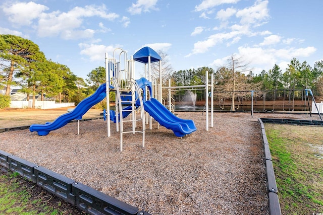 community play area featuring fence