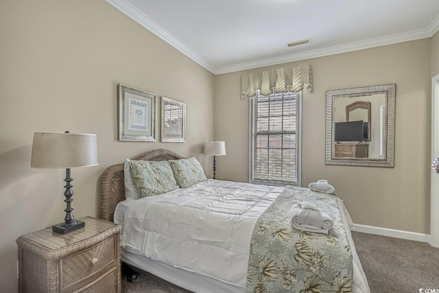 bedroom with visible vents, carpet floors, baseboards, and ornamental molding