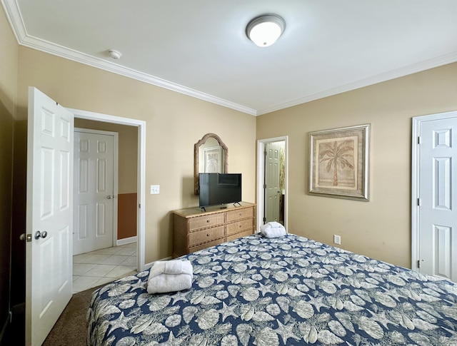 tiled bedroom featuring baseboards and ornamental molding