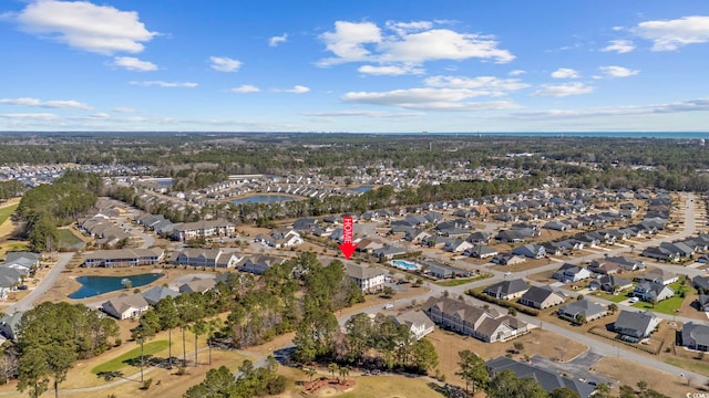 bird's eye view featuring a residential view and a water view