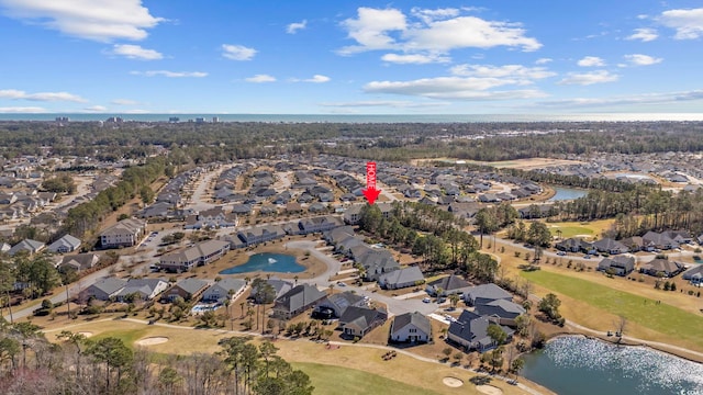 aerial view featuring a residential view, a water view, and golf course view