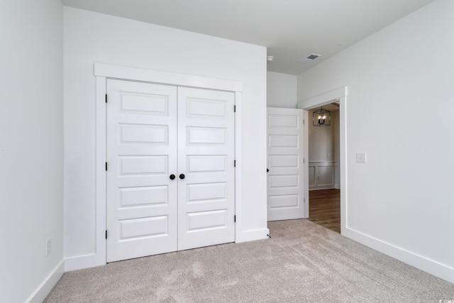 4028 Bucolic Loop, Myrtle Beach, SC 29588 - unfurnished bedroom featuring carpet floors, baseboards, and a closet