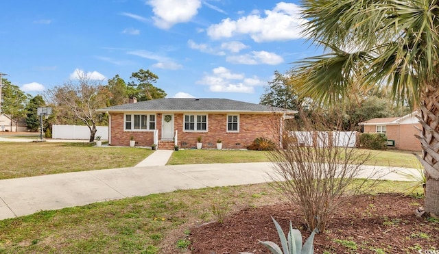 ranch-style house with crawl space, brick siding, a front lawn, and fence