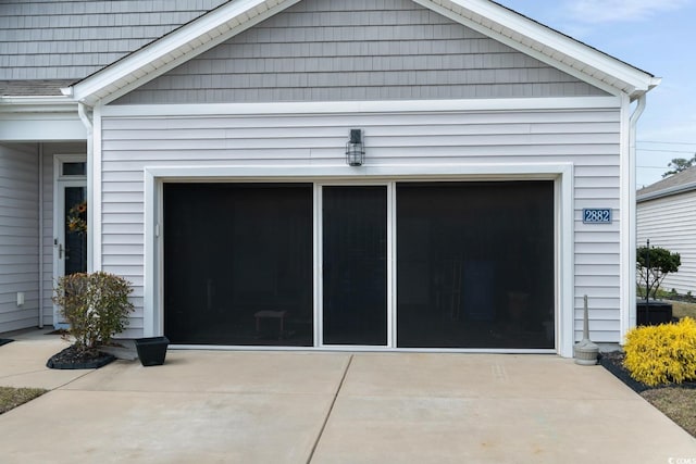 garage with driveway