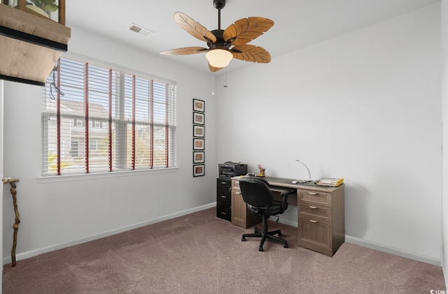 office with baseboards, light carpet, plenty of natural light, and ceiling fan