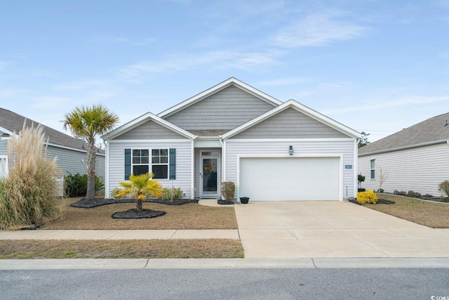 ranch-style home featuring concrete driveway and an attached garage