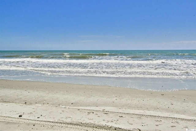property view of water featuring a beach view
