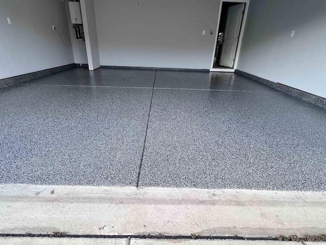 garage featuring baseboards