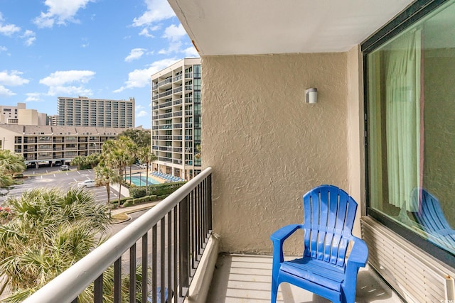 balcony featuring a city view