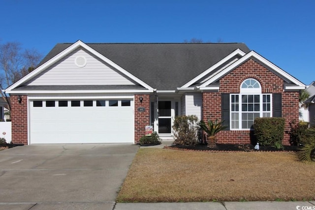 single story home featuring brick siding, concrete driveway, and a garage