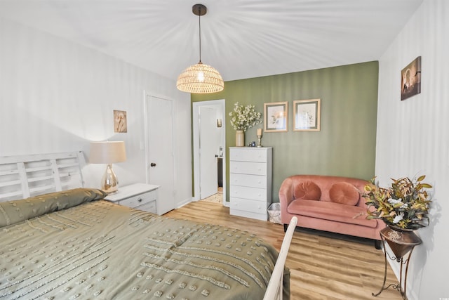 bedroom with wood finished floors