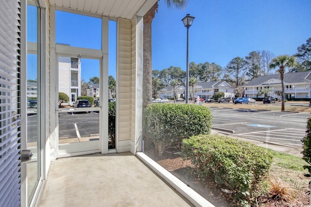 exterior space featuring plenty of natural light and a residential view