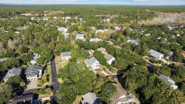 aerial view featuring a residential view and a view of trees