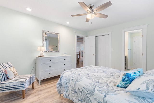 bedroom featuring light wood finished floors, recessed lighting, a closet, and ceiling fan