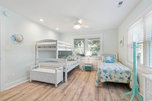 bedroom featuring recessed lighting, ceiling fan, baseboards, and light wood-style floors